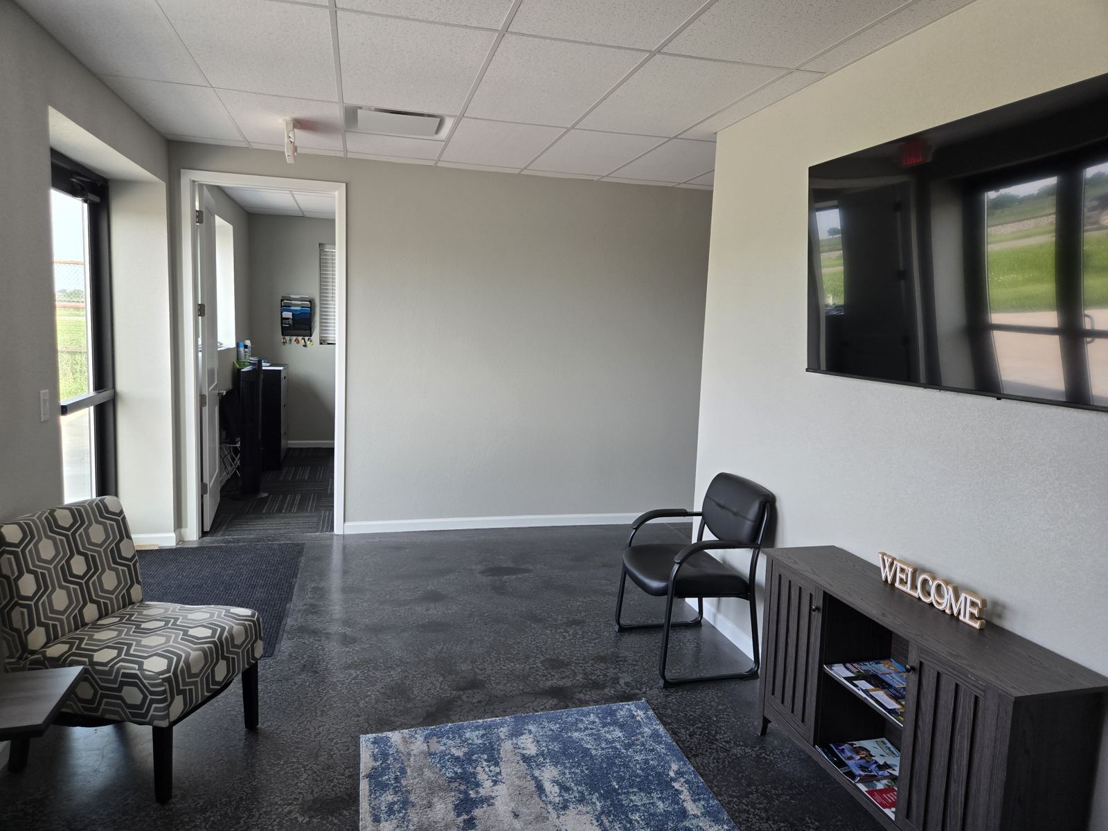 Front lobby with seating and large windows