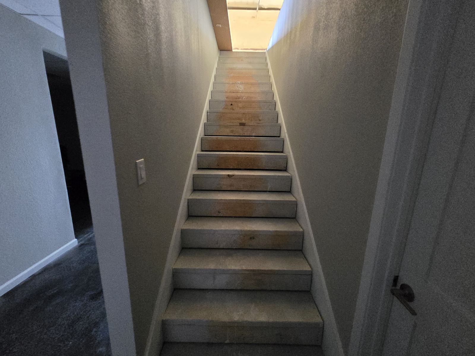 Stairway leading to the unfinished upstairs